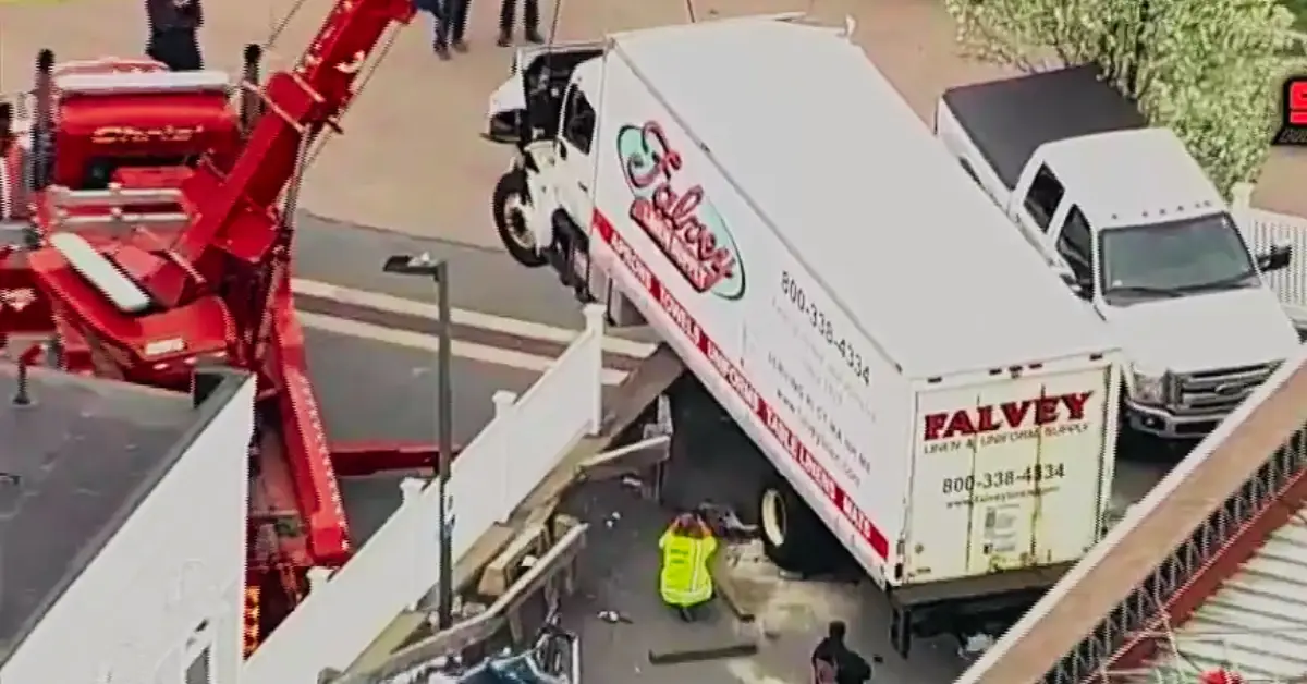 After Hitting Petrol Stations a Truck in Norfolk is Hanging Over a Wall