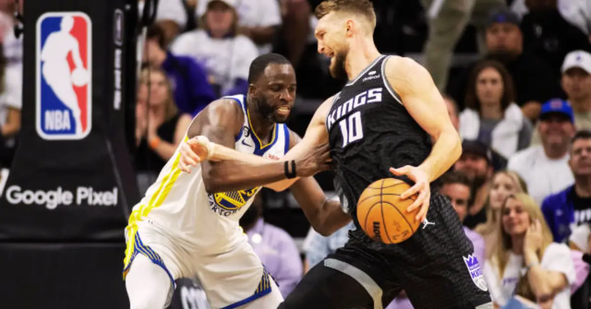 Sabonis Takes a Hit as Draymond Green's Hard Step Leads to Ejection